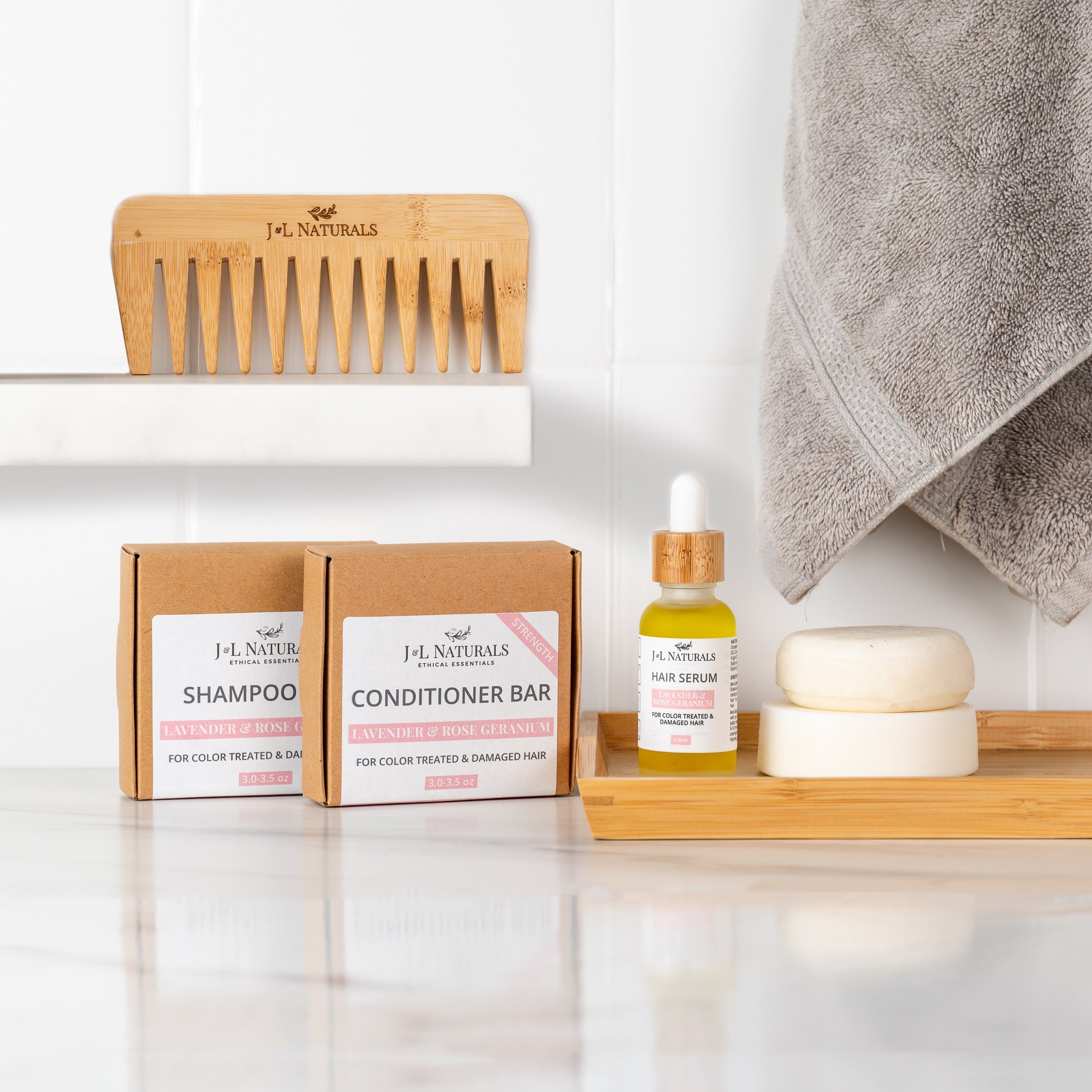 beauty kit items on tray with white background and comb on shelf