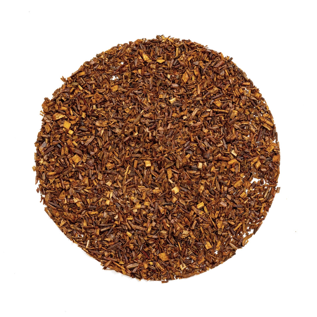 loose pile of tea in a circle with white background