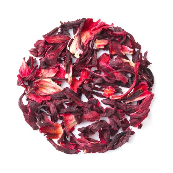 pile of loose tea in circle with white background